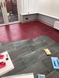 can you paint laminate flooring? An example of Gloss Paint applied to Kitchen Laminate Tile Flooring